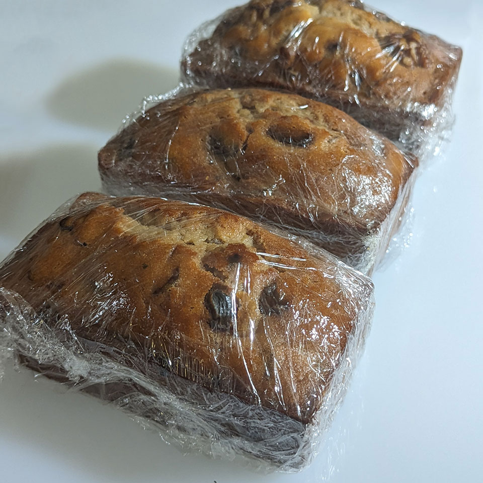 cellophane-wrapped fruitcakes