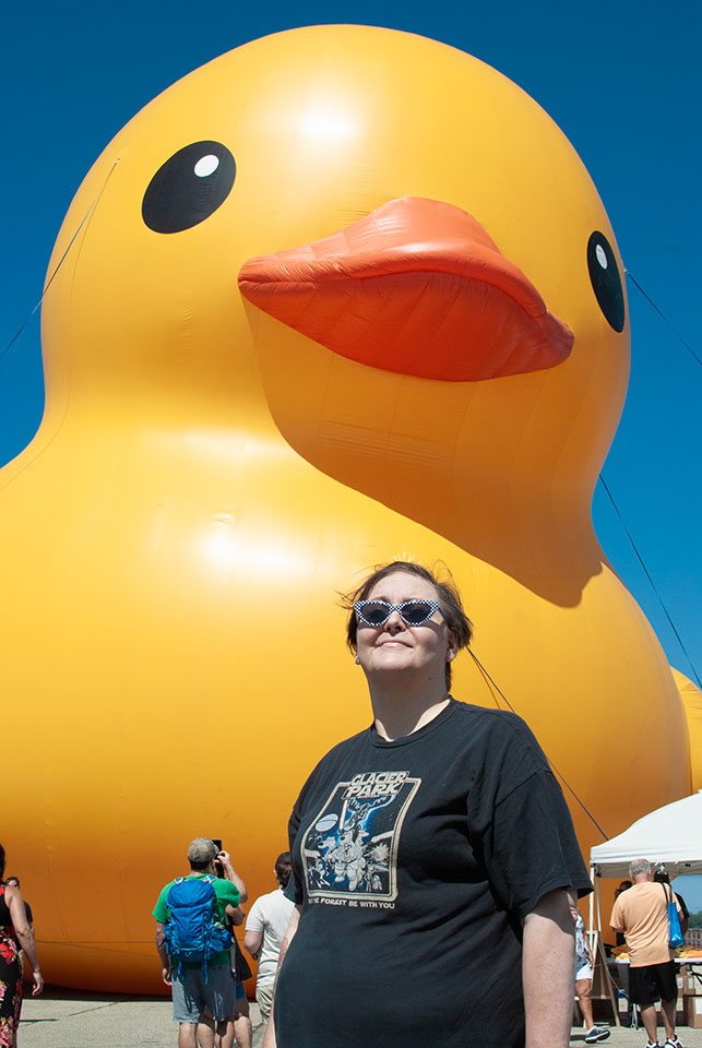 #7 stands before the world's largest inflatable rubber duck